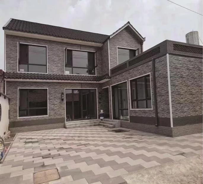 Stone pattern exterior panels around a residential courtyard
