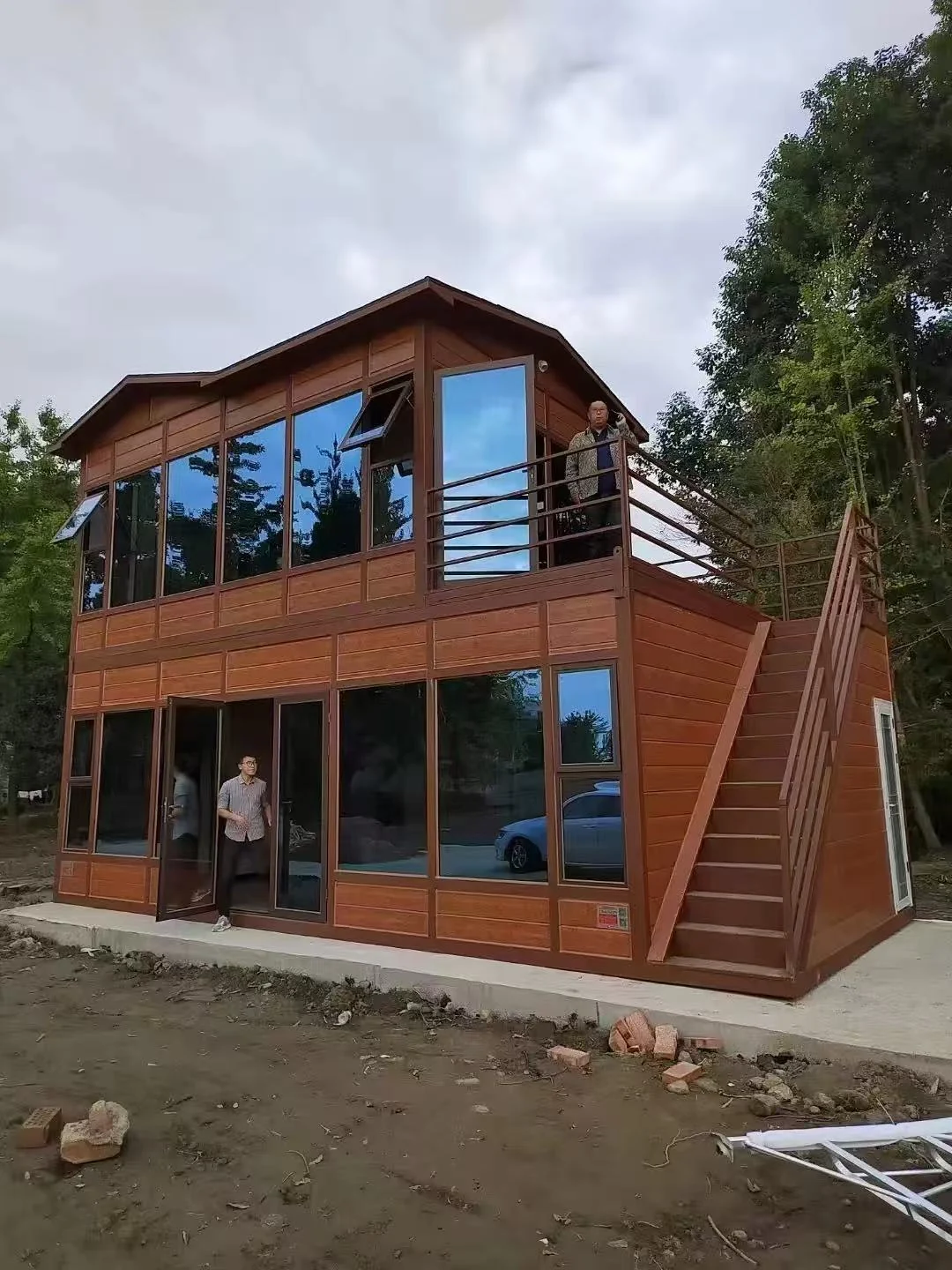 Wood finish cladding on a two storey modular building with external stairs