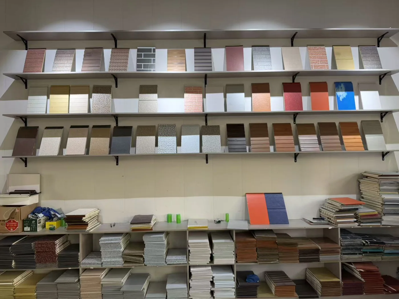 Client-provided decorative metal wall panel sample display